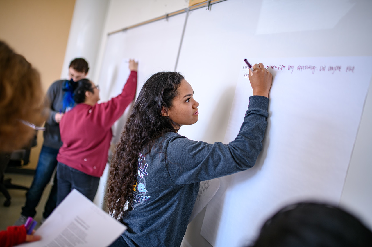 Students writing on a whiteboard at SRJC Petaluma