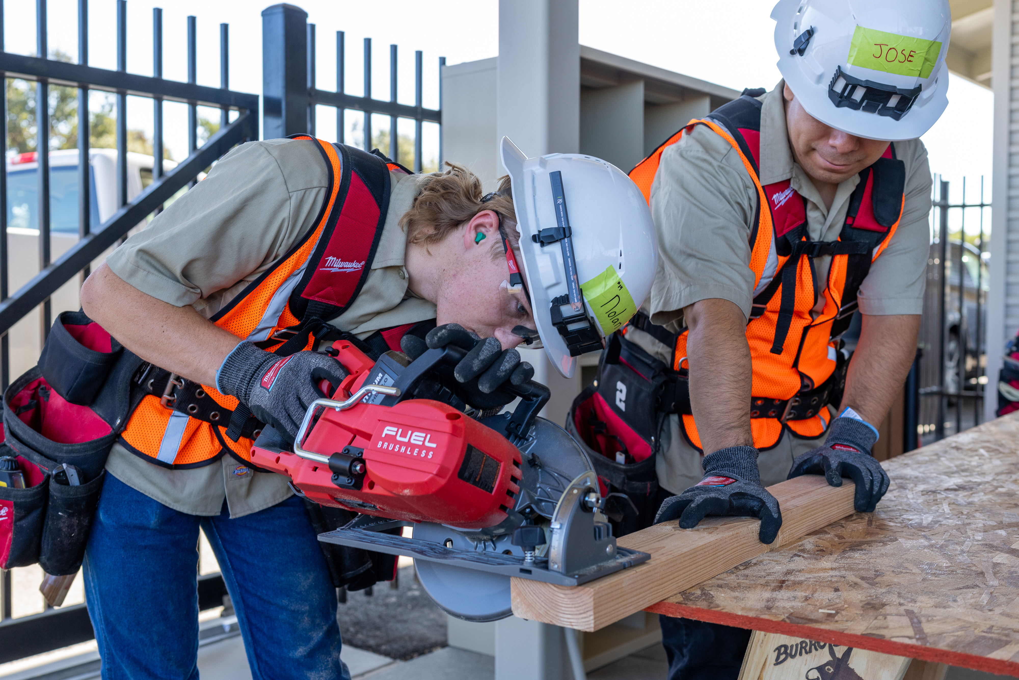 Students working with saw